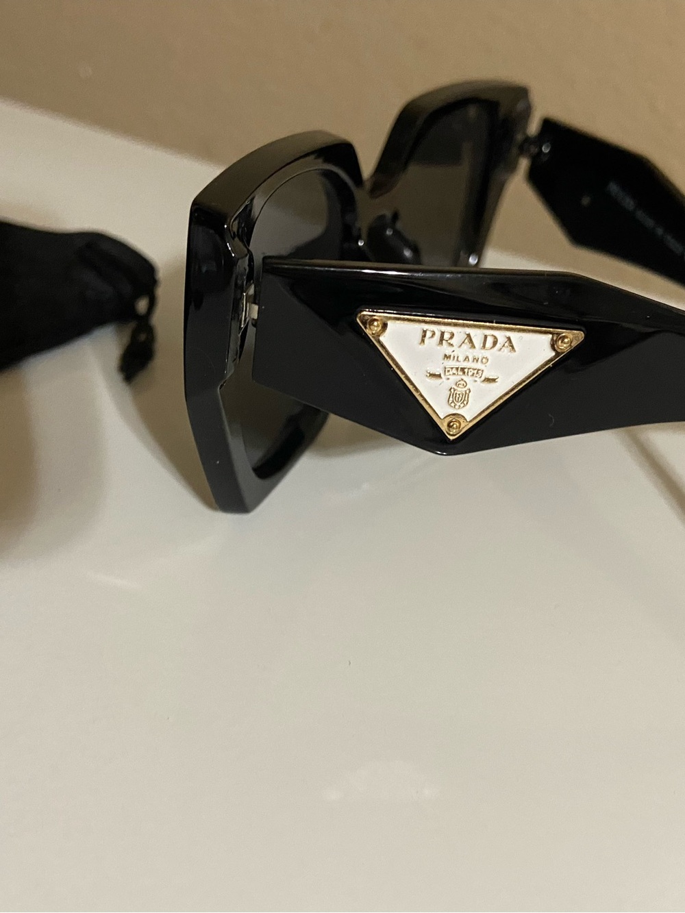 Prada Black Sunglasses with Gold Triangle Logo Plaque